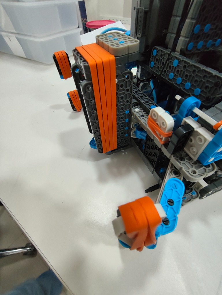 VEX Robot close up on tensioner and intake indexing mechanism